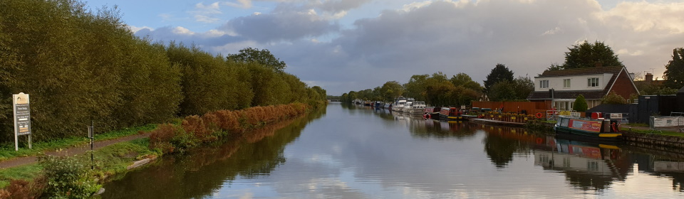Tudor Caravan Park - Boats on Canal by Lesley Munt